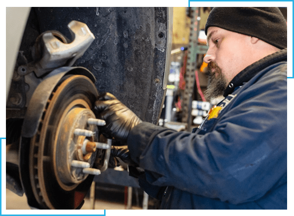 Heritage-Mechanic-Fixing-Car-Brakes